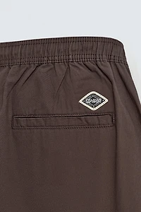 PANTALON BALLON À PLIS
