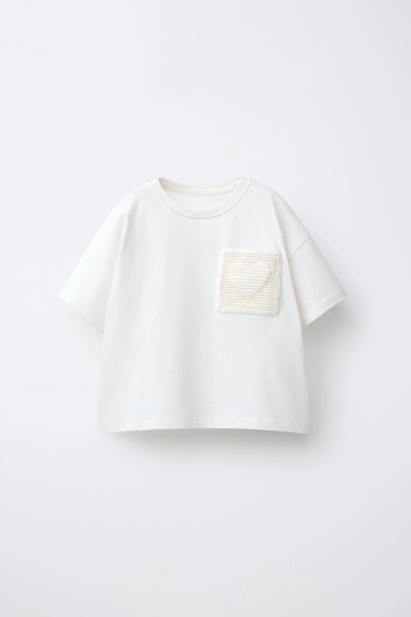 T-SHIRT À POCHE EN CROCHET