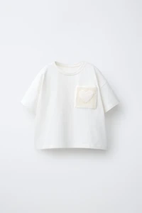 T-SHIRT À POCHE EN CROCHET