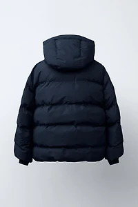 MANTEAU REMBOURRÉ ÉTIQUETTE DÉPERLANT