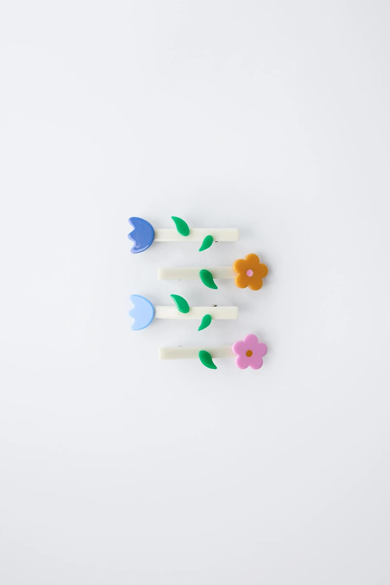 FOUR-PACK OF FLOWER HAIR CLIPS