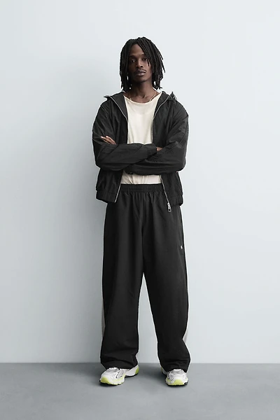 TECHNICAL PANTS WITH STRIPES