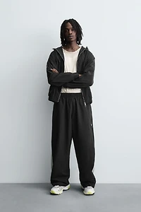 TECHNICAL PANTS WITH STRIPES