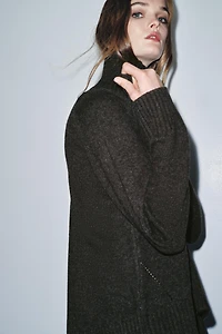 WOOL SWEATER WITH ASYMMETRIC HEM