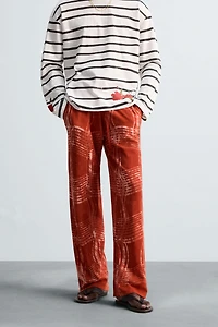 GRAPHIC PRINT KNIT PANTS © OTIS KWAME KYE QUAICOE