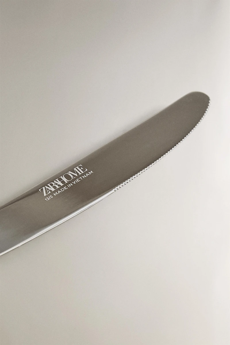 COUTEAU À DESSERT EN ACIER BRILLANT