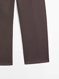 Mid-rise carrot fit trousers