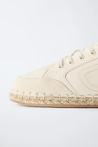 TENNIS EN JUTE