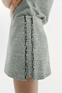 TEXTURED FRAYED MINI SKIRT