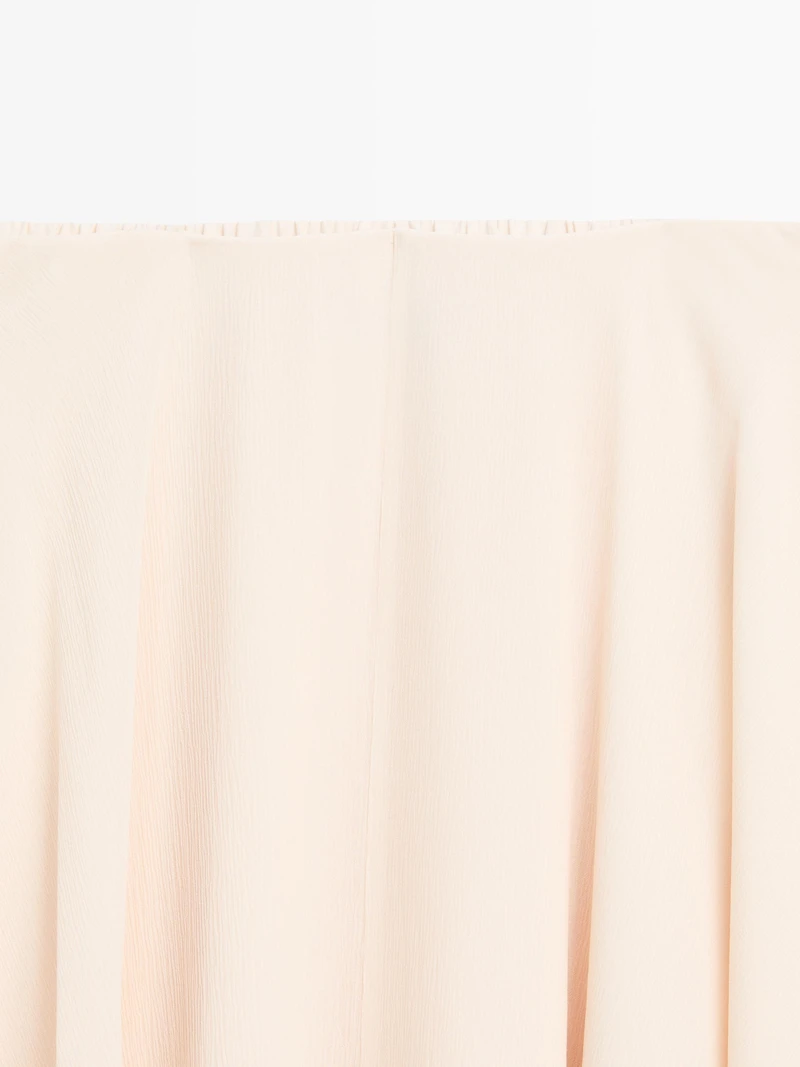 Flowing asymmetric midi skirt