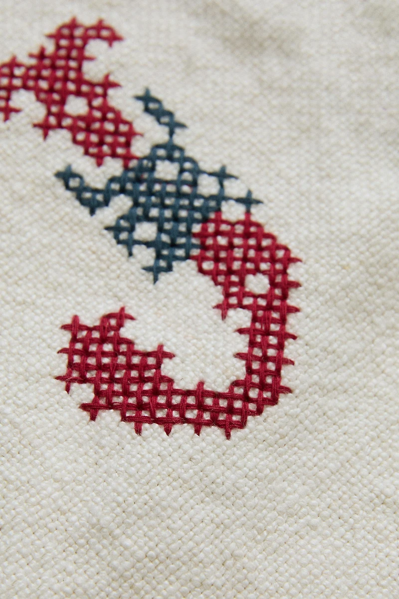 LINEN LETTER J EMBROIDERED CUSHION