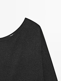 Wool blend knit sweater with asymmetric neckline