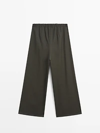 Wide-leg trousers with darts and elasticated waistband