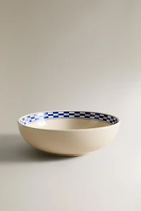 CERAMIC BOWL WITH A CHECKED DESIGN ON THE RIM