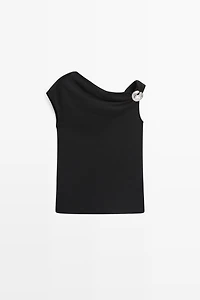 Top asymétrique détail bijou