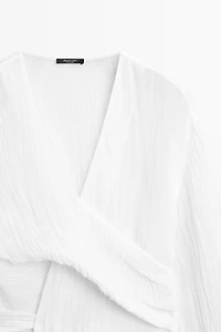 Linen blend blouse with sash belt