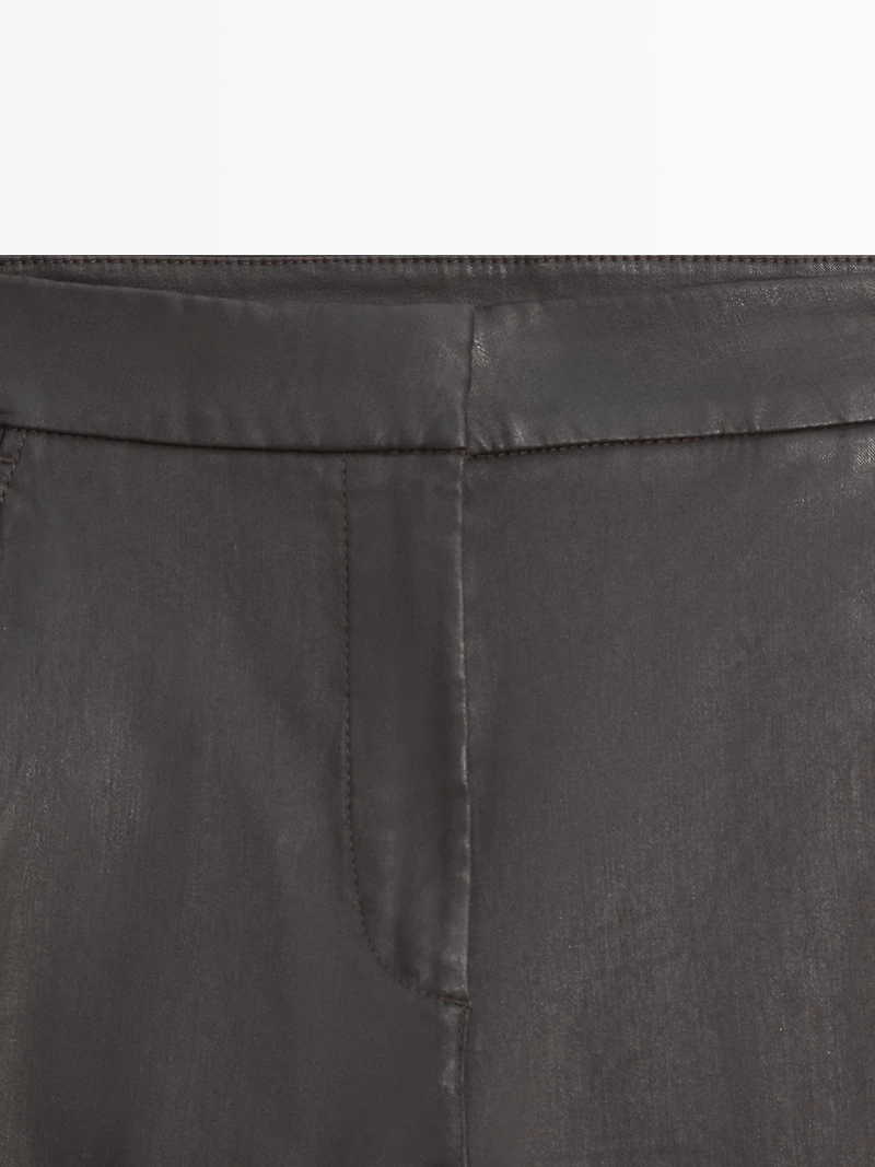 Waxed flare fit trousers