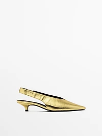 Gold high-heel slingback shoes