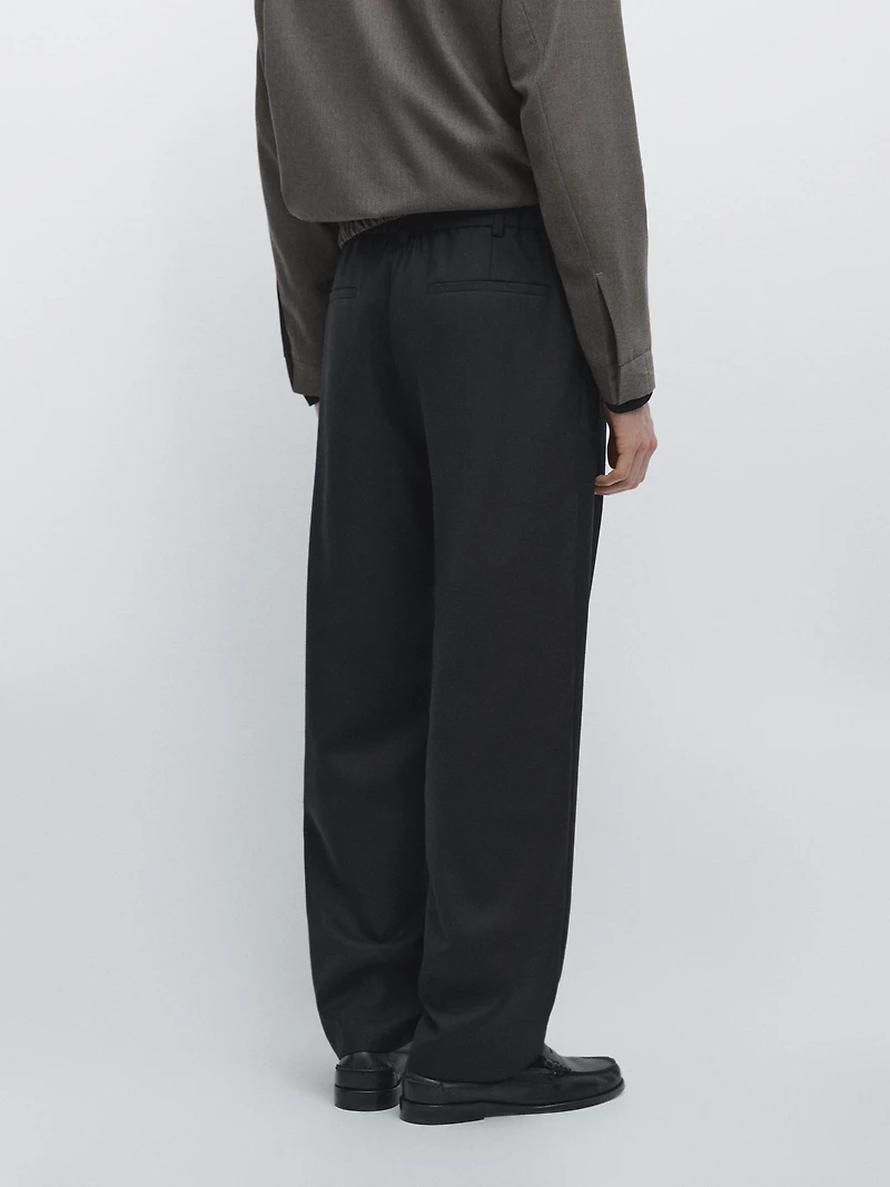 Relaxed fit wool blend trousers with darts