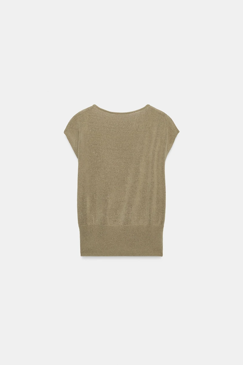 TOP EN MAILLE À FINITIONS