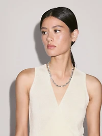 Knit crossover waistcoat with drawstring