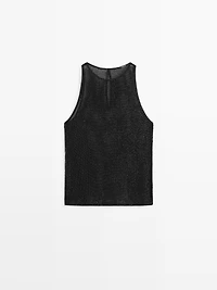 Top semi-transparent à perles fantaisie ton sur