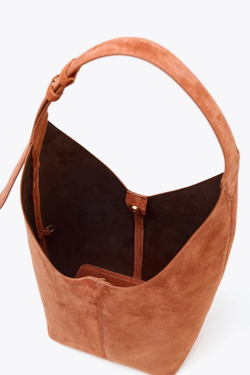 LEATHER MAXI BUCKET BAG WITH HANDLE DETAIL