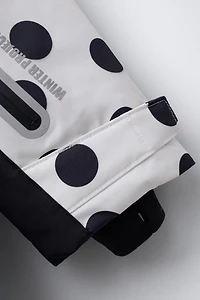 WATER RESISTANT AND WINDPROOF POLKA DOT JUMPSUIT