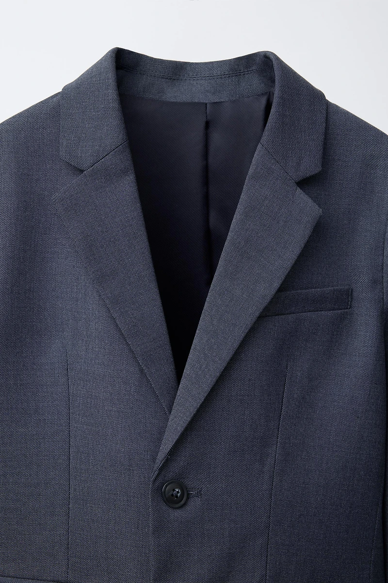 TEXTURED SUIT JACKET