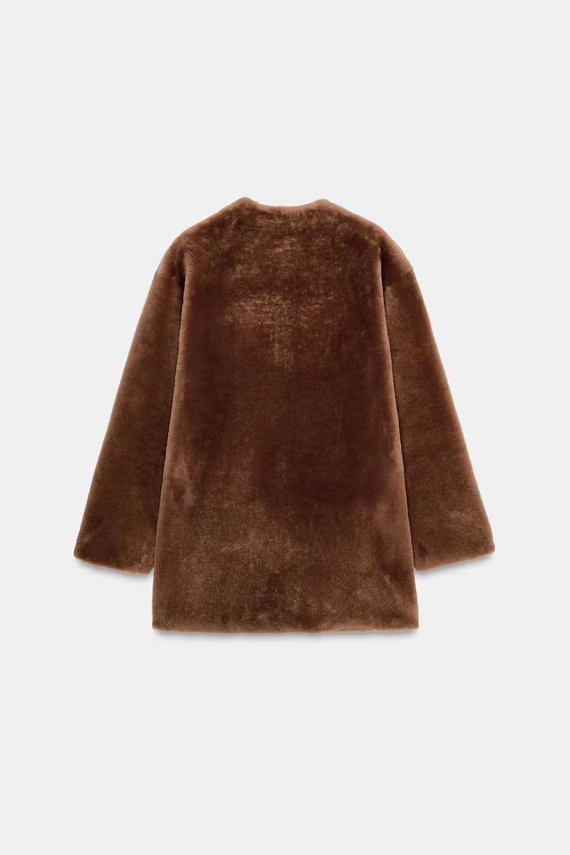 MANTEAU 100 % CUIR RÉVERSIBLE