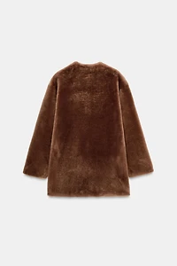 MANTEAU 100 % CUIR RÉVERSIBLE