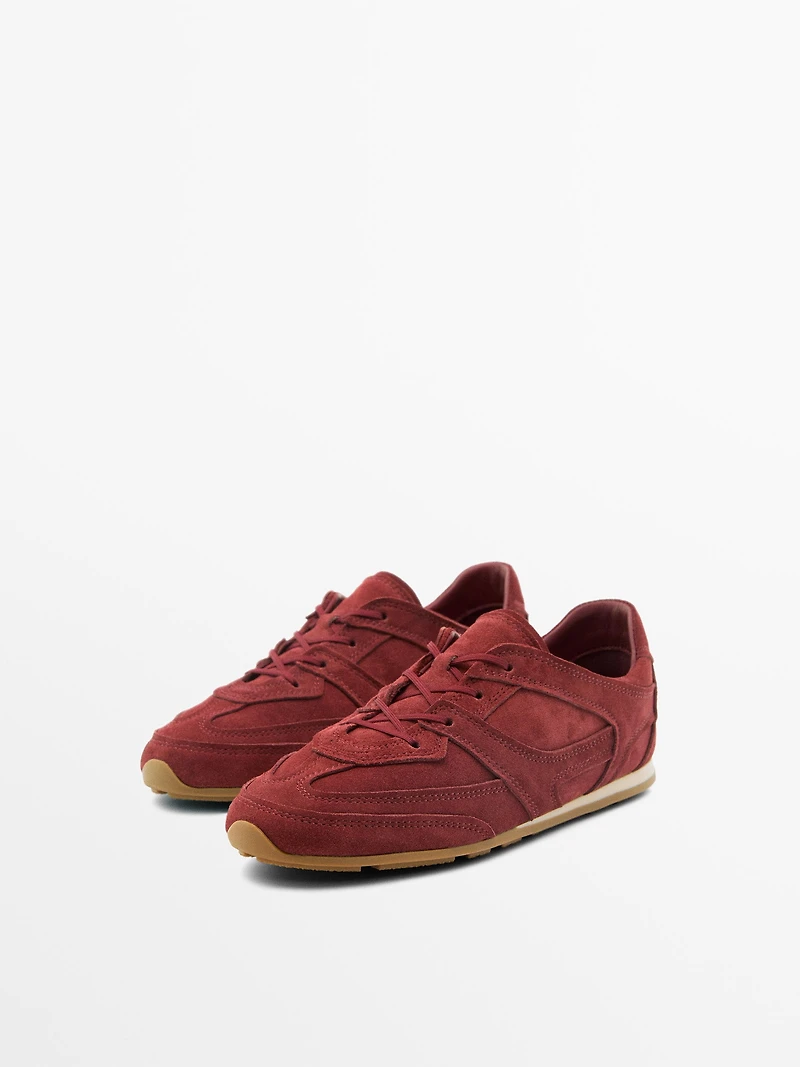 Split leather trainers with piece details