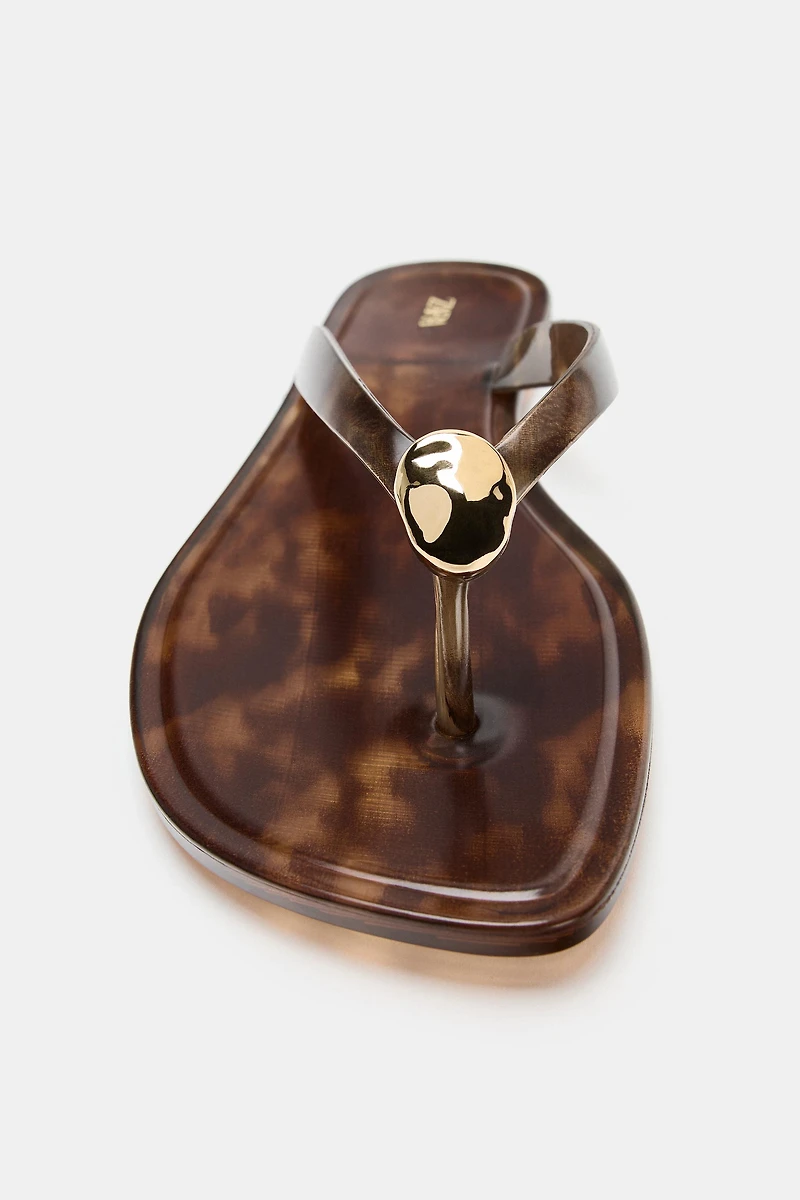 FLAT SANDALS WITH EMBELLISHMENT