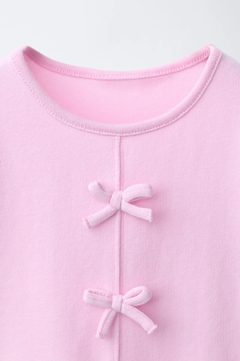 BOW AND RUFFLE T-SHIRT