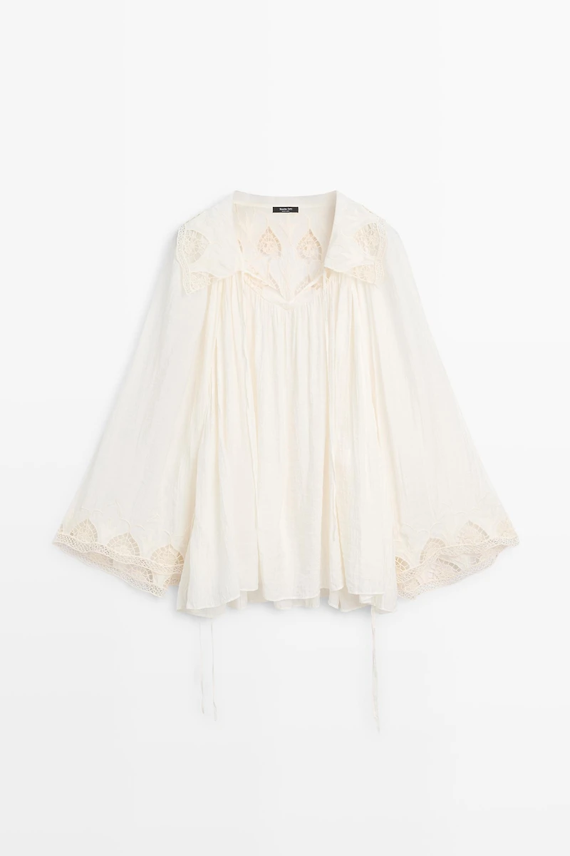 Embroidered flowing blouse