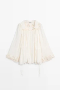 Embroidered flowing blouse