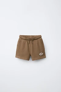 SHORT TEINT EN PIÈCE