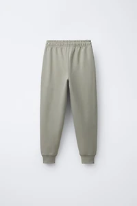 ENSEMBLE INTERLOCK SWEAT ET JOGGER INSCRIPTION EN RELIEF