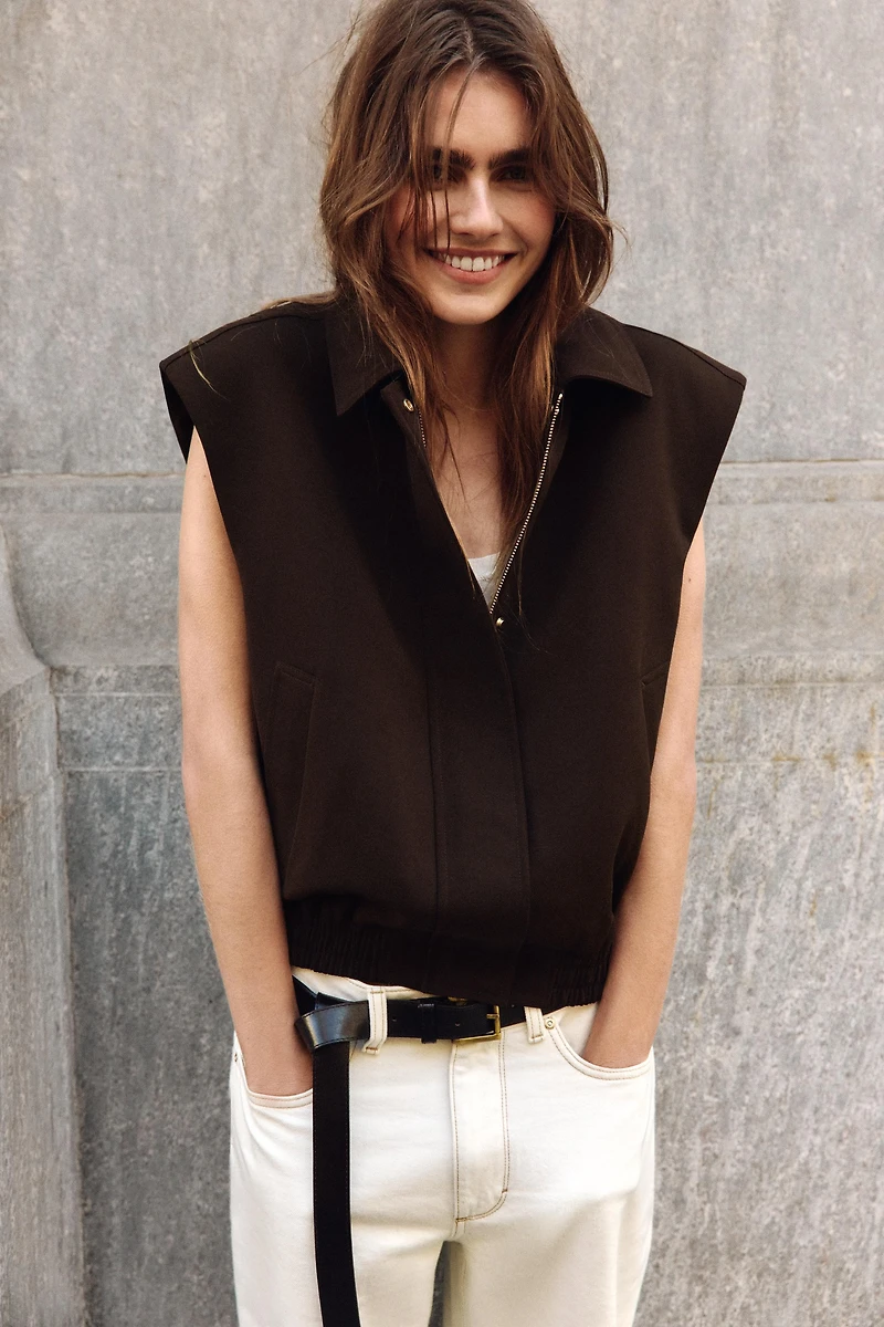 ELASTIC HEM SHOULDER PAD VEST