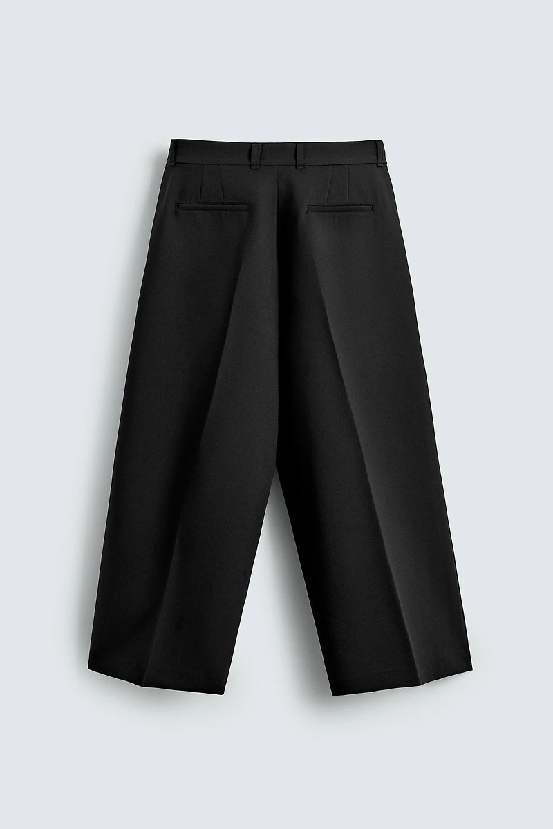 PANTALON COUPE LARGE À PLIS