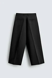 PANTALON COUPE LARGE À PLIS
