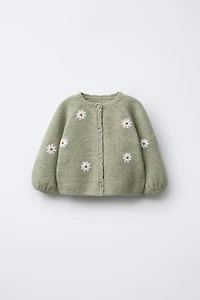 GILET EN MAILLE MARGUERITES BRODÉES