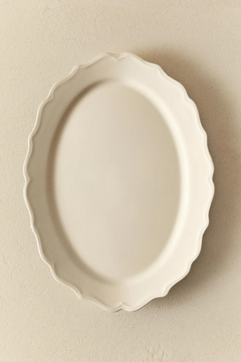 EARTHENWARE SERVING DISH WITH RAISED-DESIGN EDGE