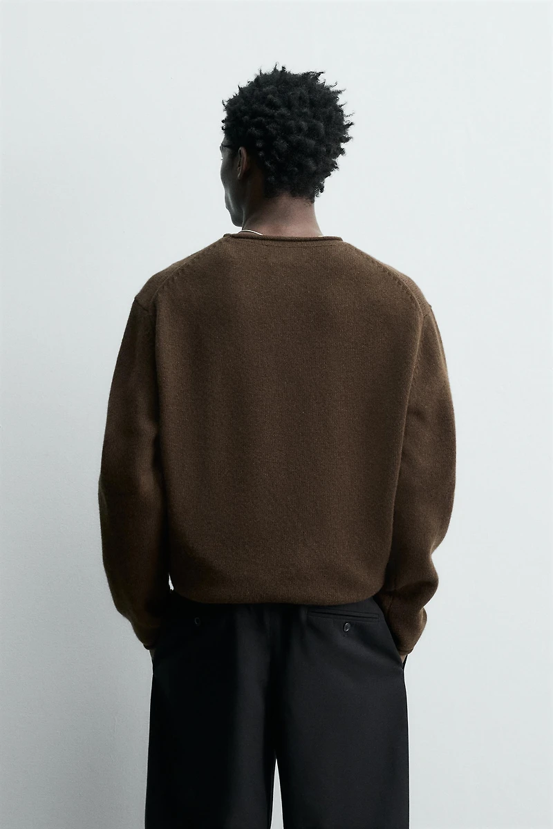 100% WOOL ROLLED-EDGE SWEATER