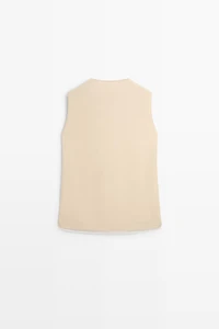 Flowing double-layer top with contrast detail