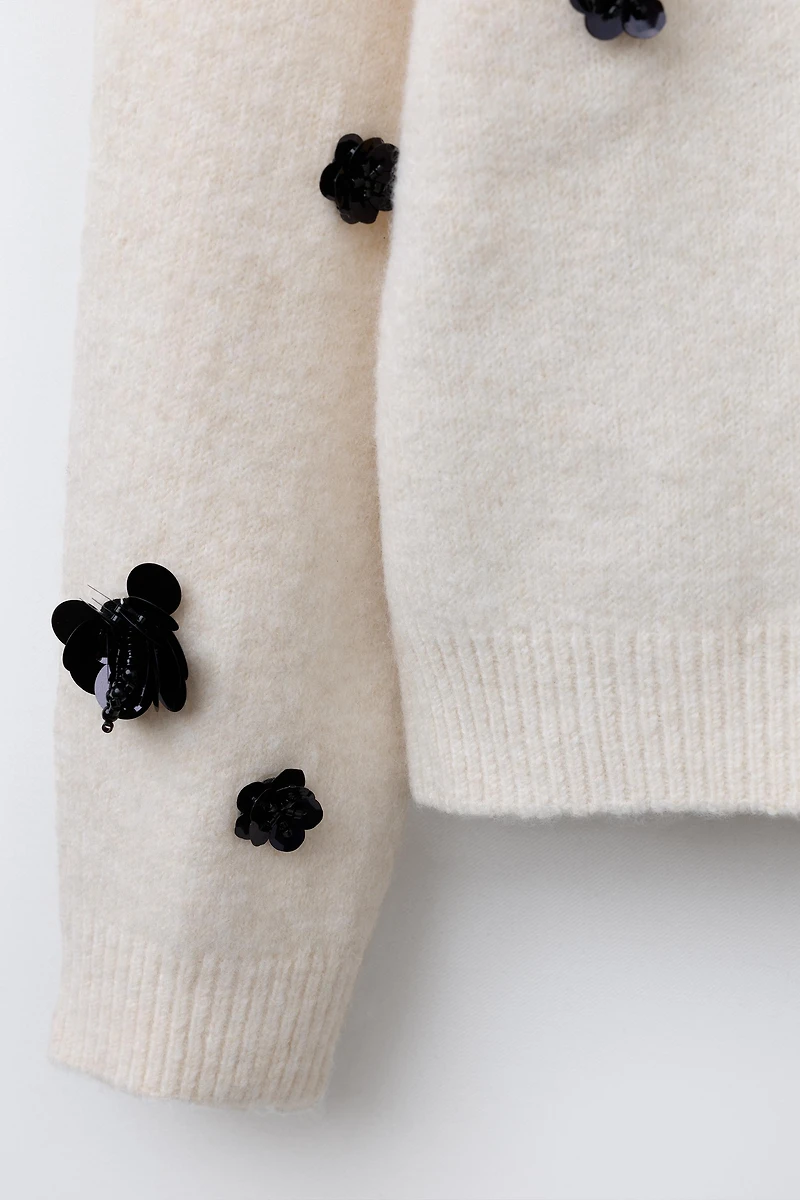 PULL EN MAILLE FLEURS PAILLETTES