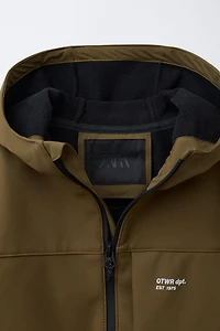 HOODED TECHNICAL JACKET