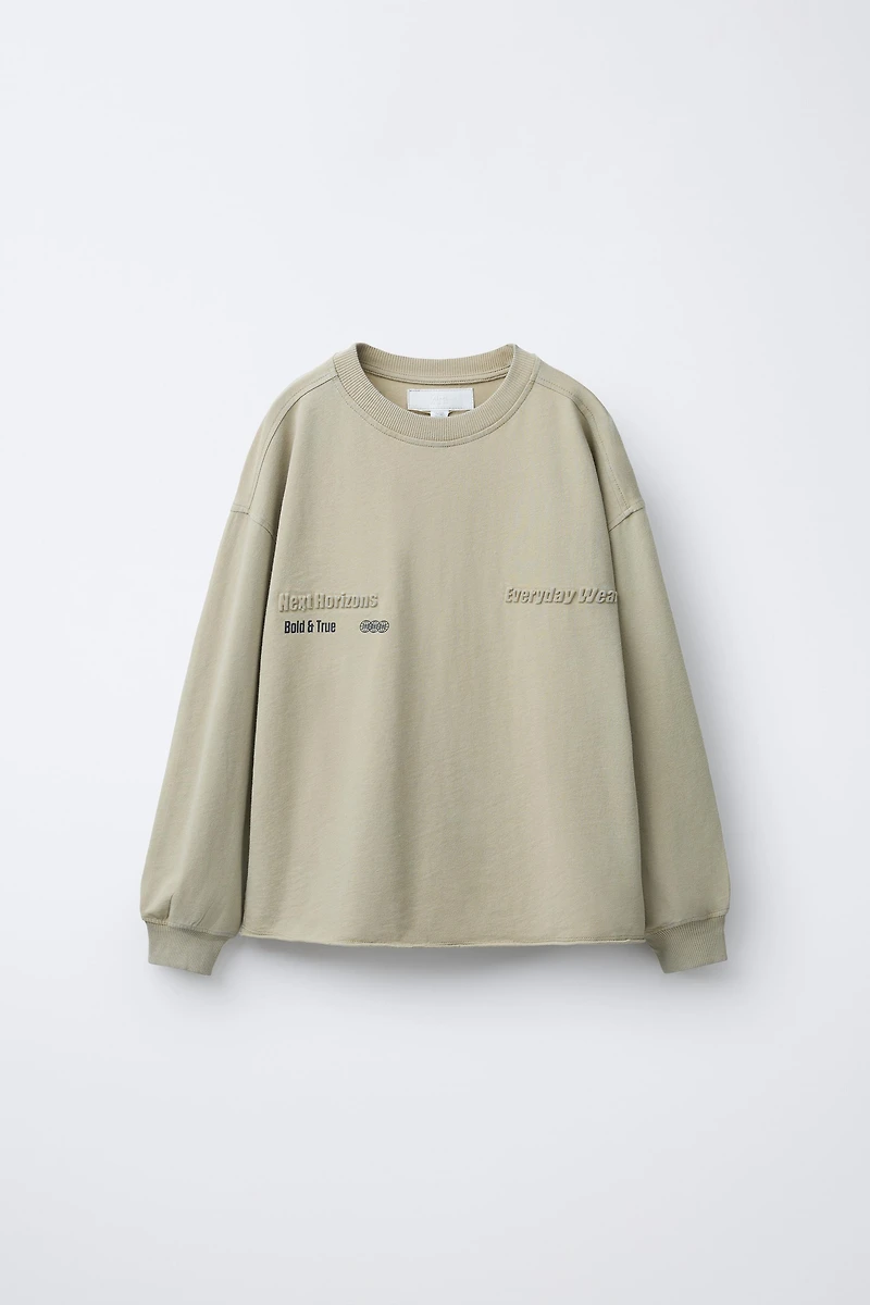 WASHED EFFECT EMBOSSED TEXT T-SHIRT