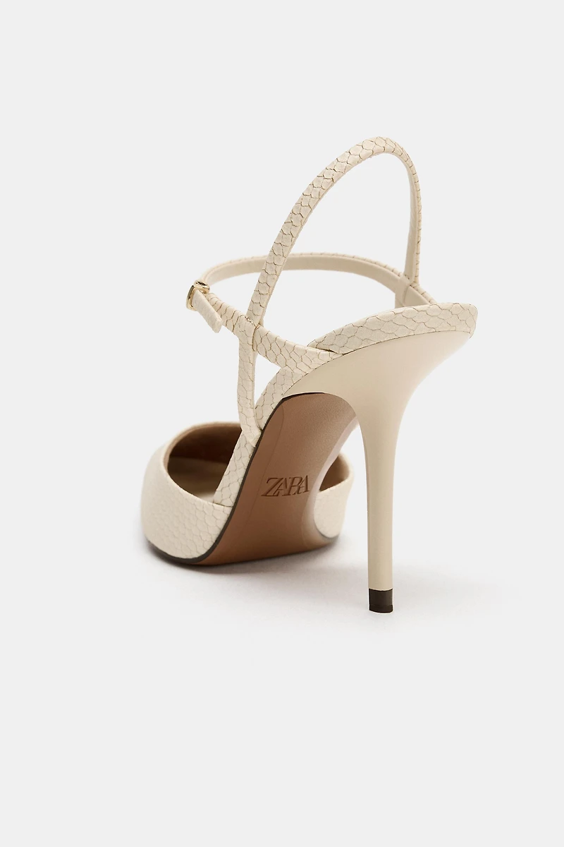 CHAUSSURES OUVERTES À L'ARRIÈRE AVEC EFFET RELIEF