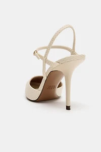 CHAUSSURES OUVERTES À L'ARRIÈRE AVEC EFFET RELIEF